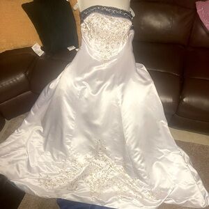 Size 14 Wedding Dresses… Worn once then dry cleaned.
